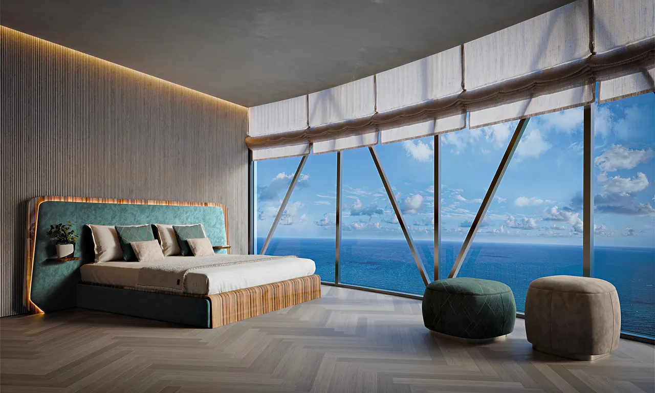 Primary bedroom with teal upholstered bed, herringbone floors and floor-to-ceiling ocean views