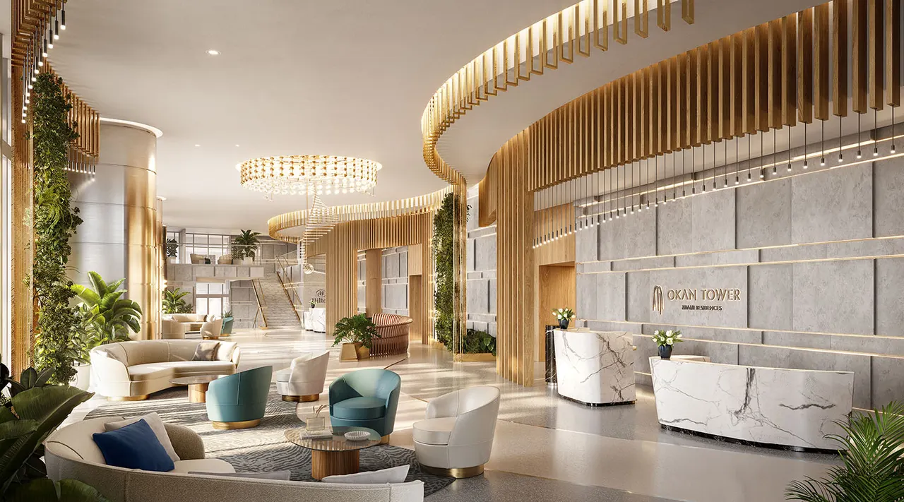 Okan Tower lobby with marble concierge desks, gold ceiling detailing and curved lounge seating