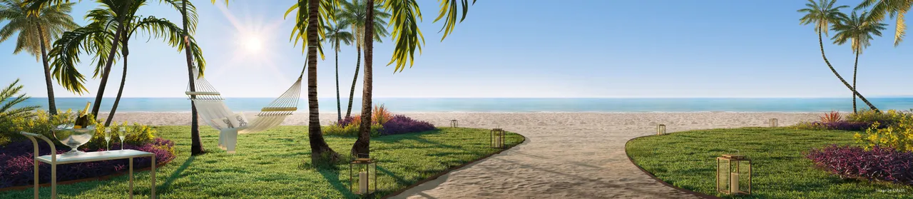 Landscaped beach garden with palm trees, hammocks and a paved path leading to the sand and ocean