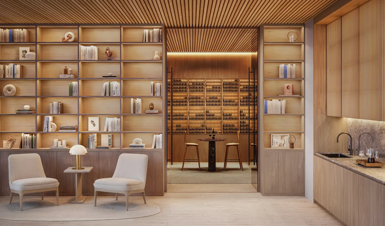 Residents' library lounge in warm oak with armchairs and a glass-walled wine room beyond