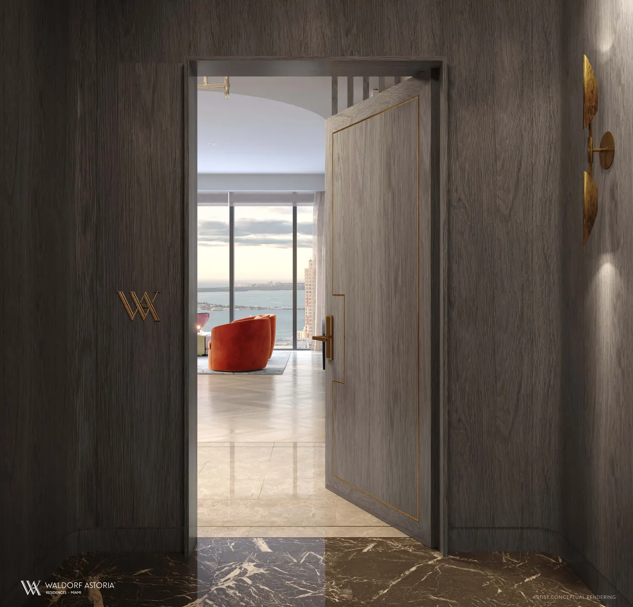 Private residence entry with wood-paneled foyer, open door and living room with water view beyond