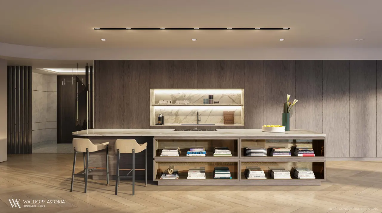 Kitchen island with marble countertop, open shelving and two counter stools under wood cabinetry