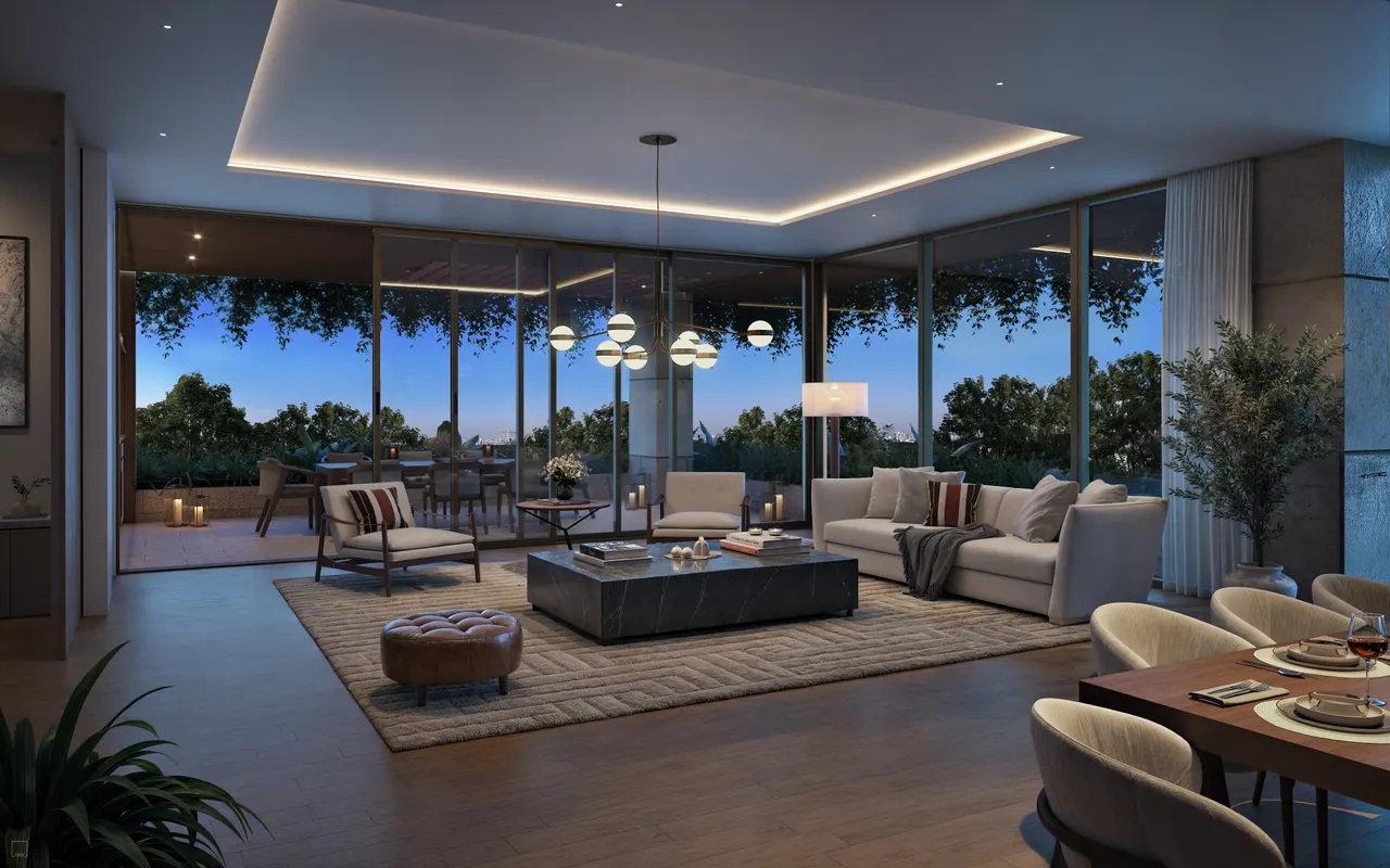 Living room at dusk with floor-to-ceiling glass, sectional sofa and adjoining dining table